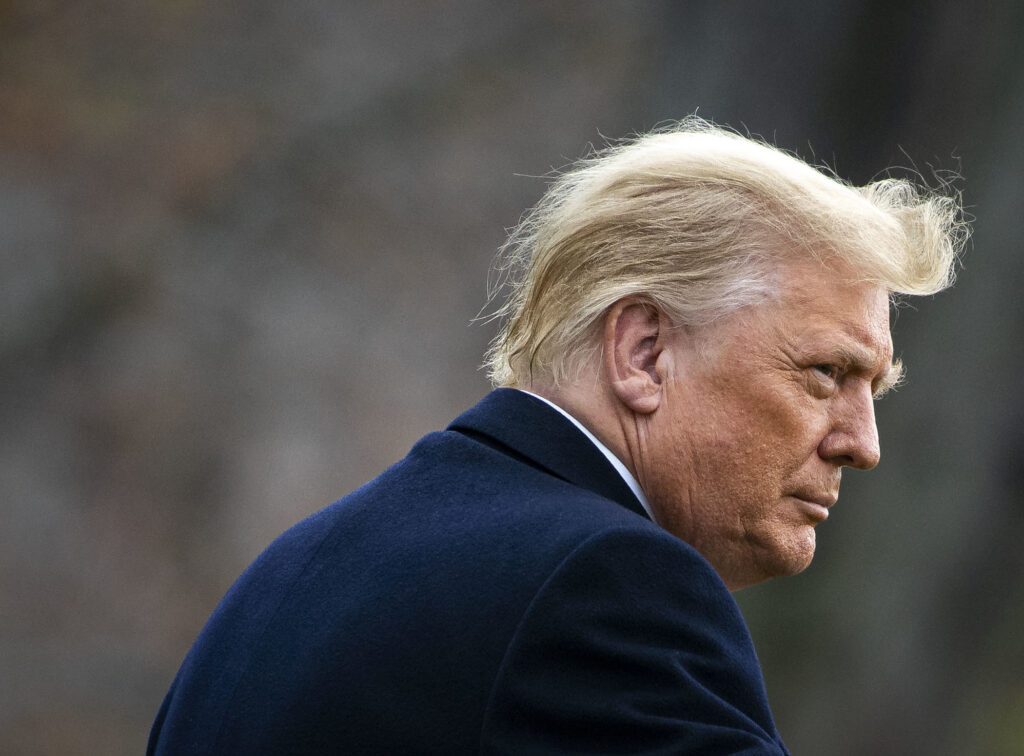 President Trump, seen here at the White House on Dec. 12, has signed the coronavirus relief package. CREDIT: Al Drago/Getty Images