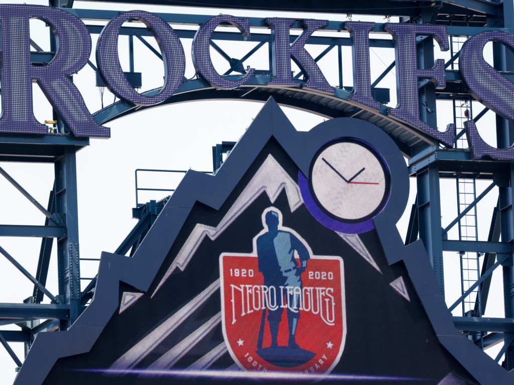 A detail of the scoreboard honoring the 100th anniversary of the Negro Leagues on display during a game between the Colorado Rockies and the Texas Rangers at Coors Field in Denver in August. Justin Edmonds/Getty Images