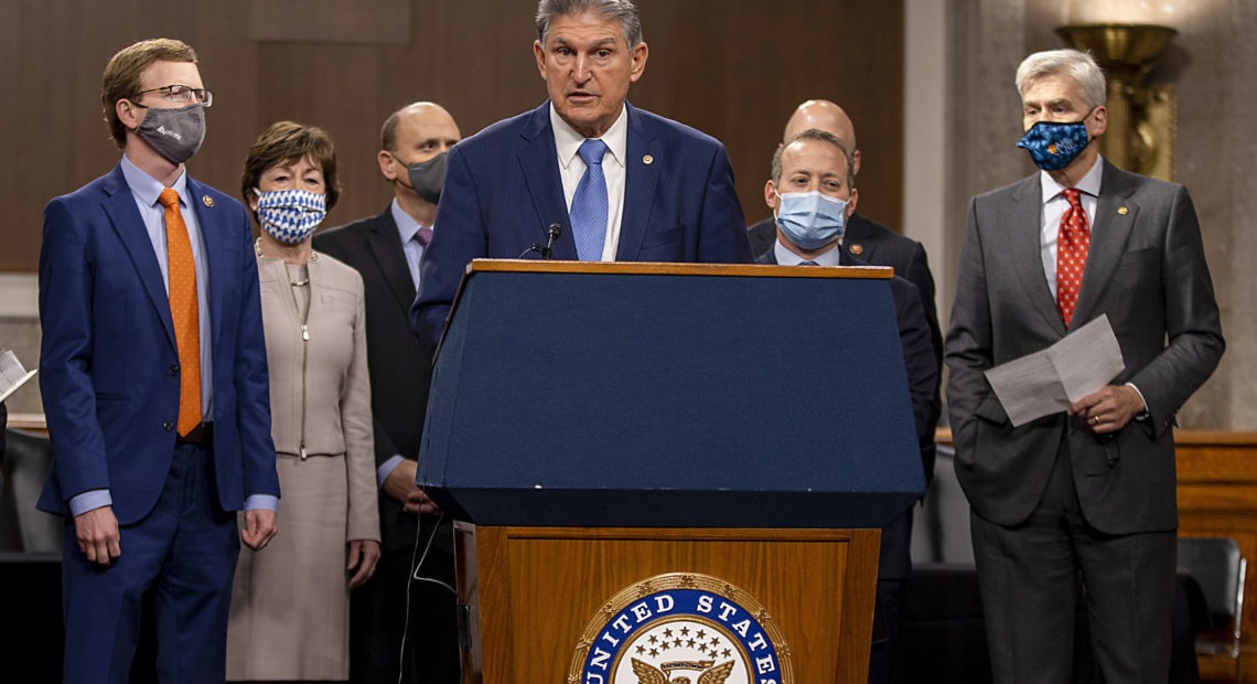 West Virginia Sen. Joe Manchin with group of Democratic and Republican senators