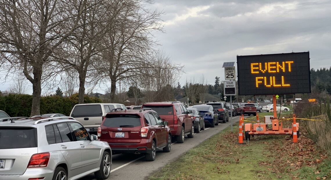 Eager seniors filled up all of the first come, first serve slots at a drive-thru COVID vaccination clinic before the first shots were even given on Thursday in Sequim, Washington. CREDIT: Tom Banse/N3