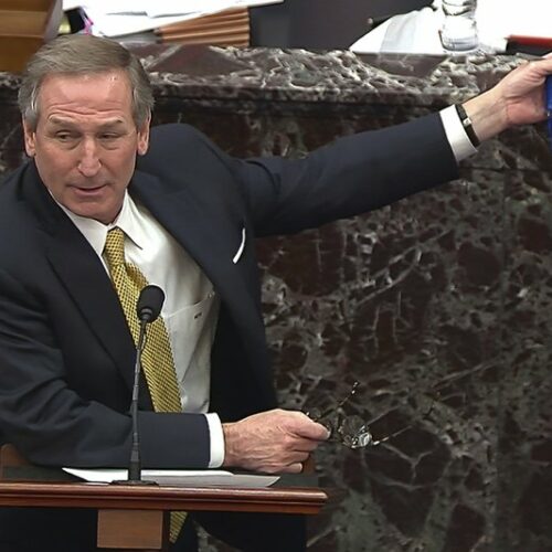 In this image from video, Michael van der Veen, an attorney for former President Donald Trump, answers a question from Sen. Bill Cassidy, R-La., during the second impeachment trial of former President Donald Trump in the Senate at the U.S. Capitol in Washington, Friday, Feb. 12, 2021. CREDIT: Senate Television via AP