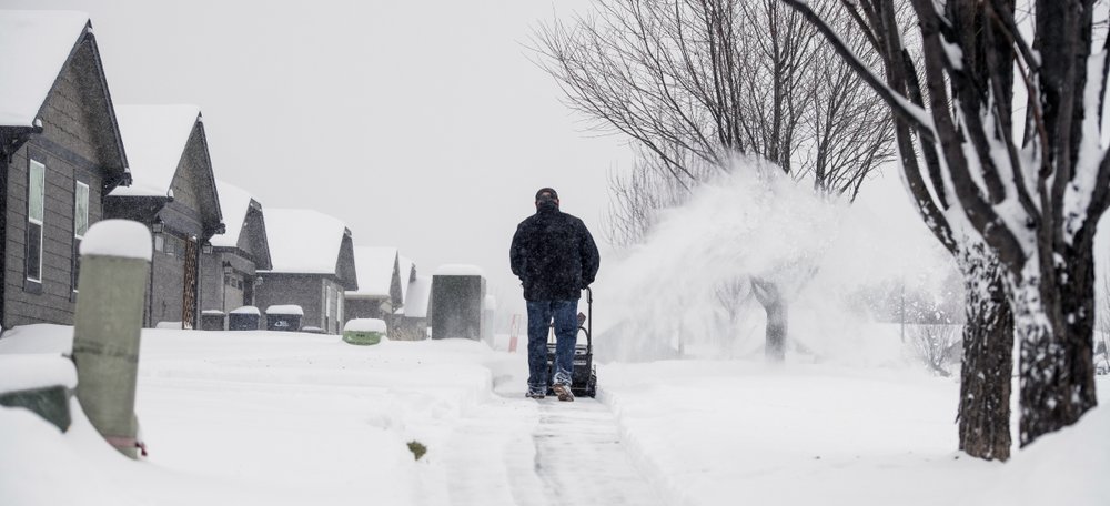 Skip Cundiff plays good neighbor as he clears sidewalks around a housing area in Walla Walla, Wash., Saturday, Feb. 13, 2021. CREDIT: Greg Lehman/Walla Walla Union-Bulletin via AP