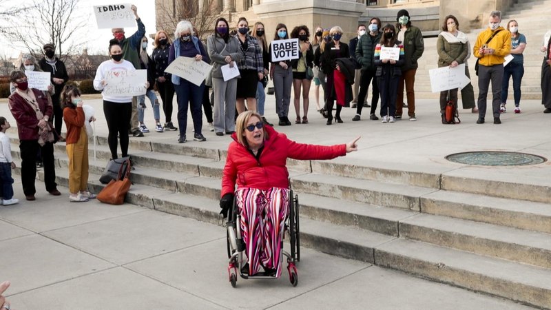 Rep. Muffy Davis, D-Ketchum, rallies a group of demonstrators in front of the Idaho Statehouse, Wednesday, March 3, 2021, in Boise. They decried the decision by the Idaho House of Representatives that killed HB 226 the day before. The bill would have would provided $6 million in federal grants for early childhood education in Idaho. The vote was split and failed by one vote. CREDIT: Darin Oswald/Idaho Statesman via AP