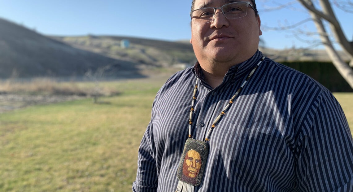 The Nez Perce tribe's vice chairman Casey Mitchell proudly wears a bead necklace sewn by his mother as a college graduation present that depicts Chief Joseph. CREDIT: Kirk Siegler/NPR