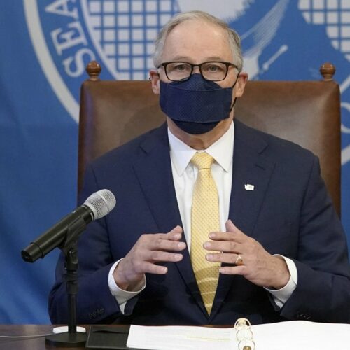 Washington Gov. Jay Inslee speaks during a news conference, March 12, 2021, at the Capitol in Olympia, Wash. Inslee said he will issue an emergency proclamation next week that will require all public schools in the state to offer students an in-person learning option starting in April. CREDIT: Ted S. Warren/AP