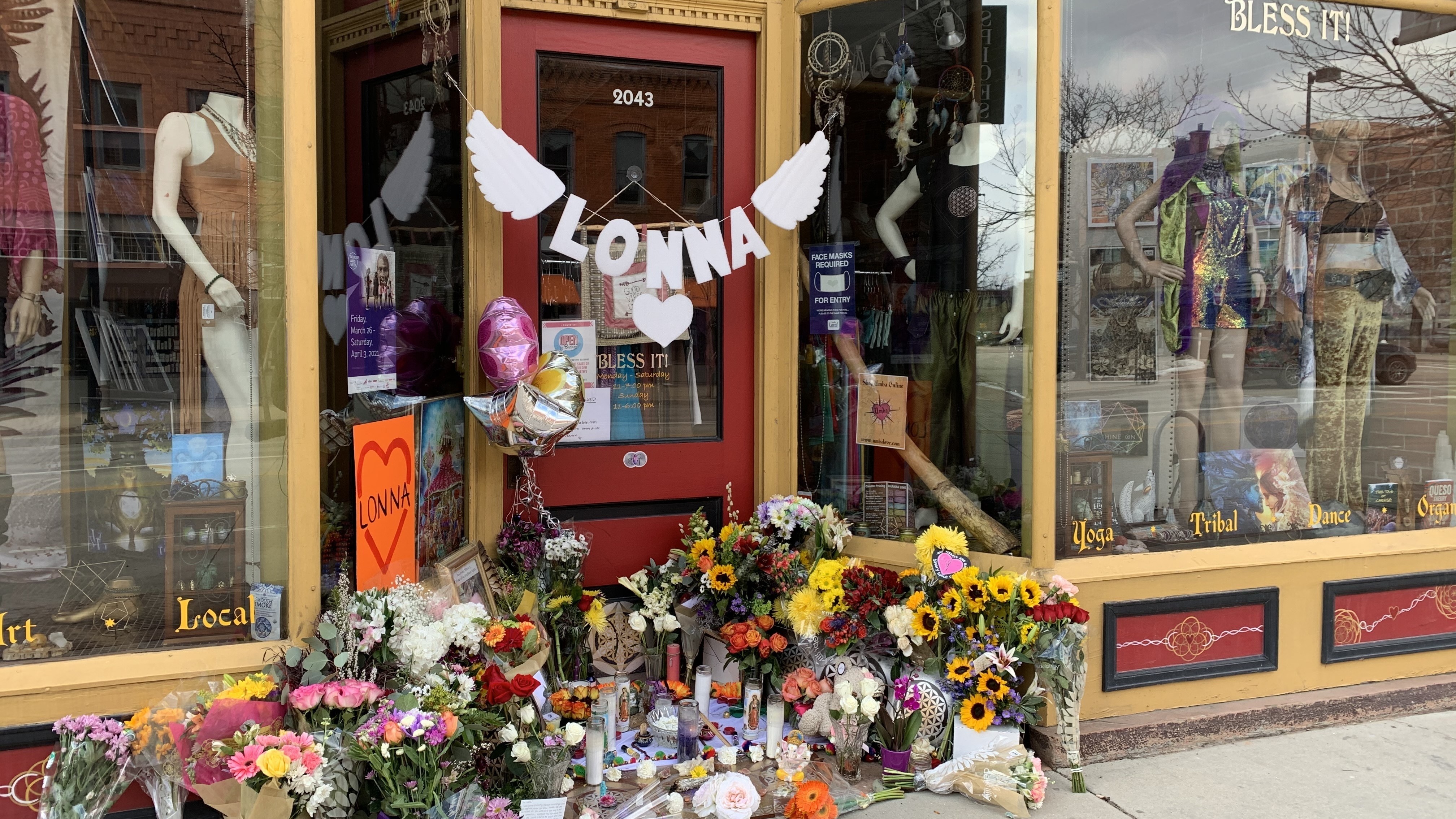 A makeshift memorial in front of a downtown Boulder store that shooting victims Tralona Bartkowiak co-owned with her sister. CREDIT: Kirk Siegler /NPR