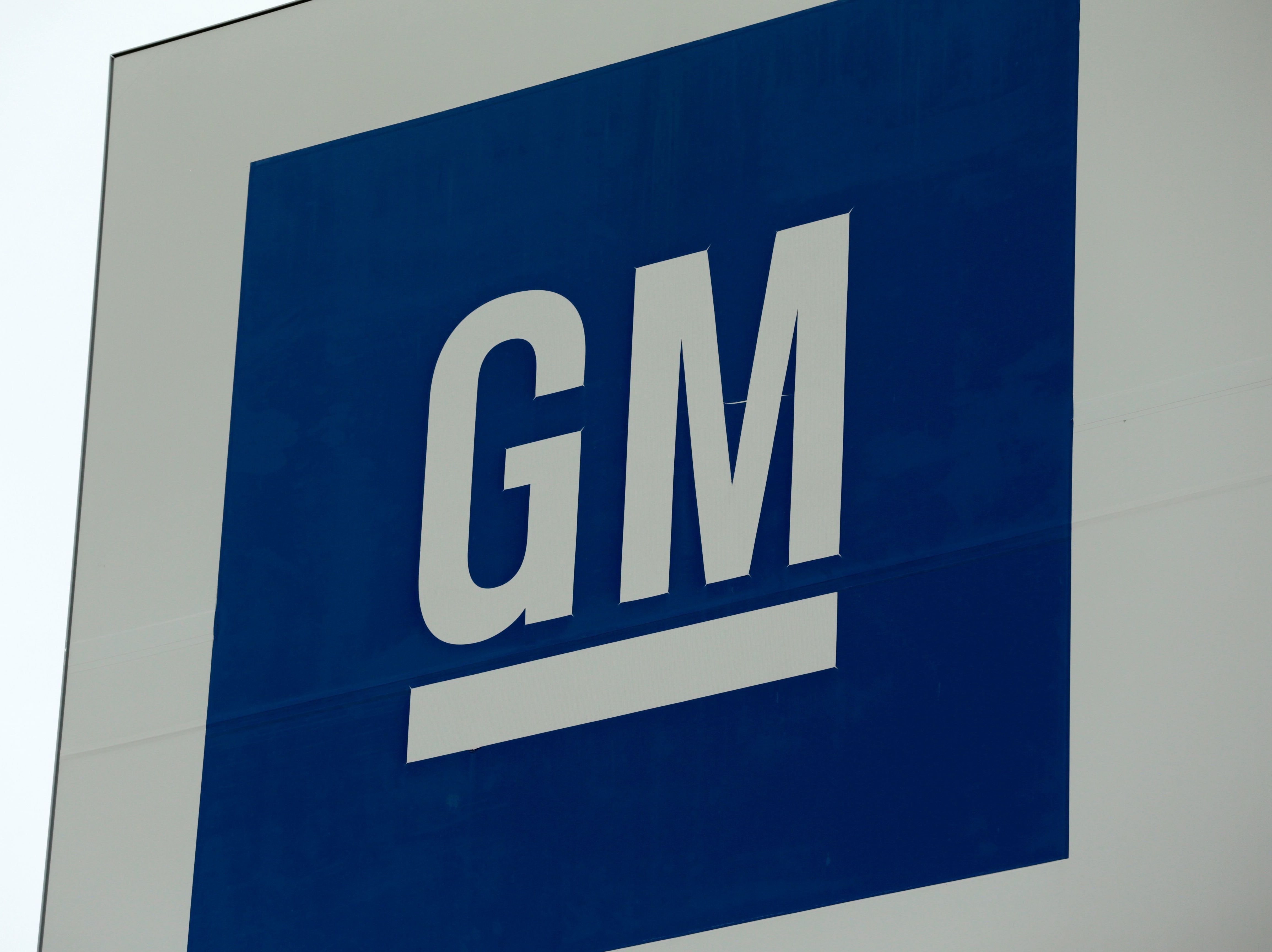 A sign is seen outside of a General Motors plant in Detroit, on Jan. 27, 2020. GM said on Thursday it is idling more plants as it continues to deal with a shortage of chips. CREDIT: Jeff Kowalsky/AFP via Getty Images