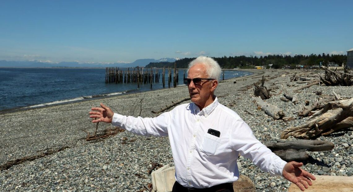 Point Roberts Chamber of Commerce President Brian Calder at a beach left deserted by cross-border travel restrictions. CREDIT: Tom Banse/N3