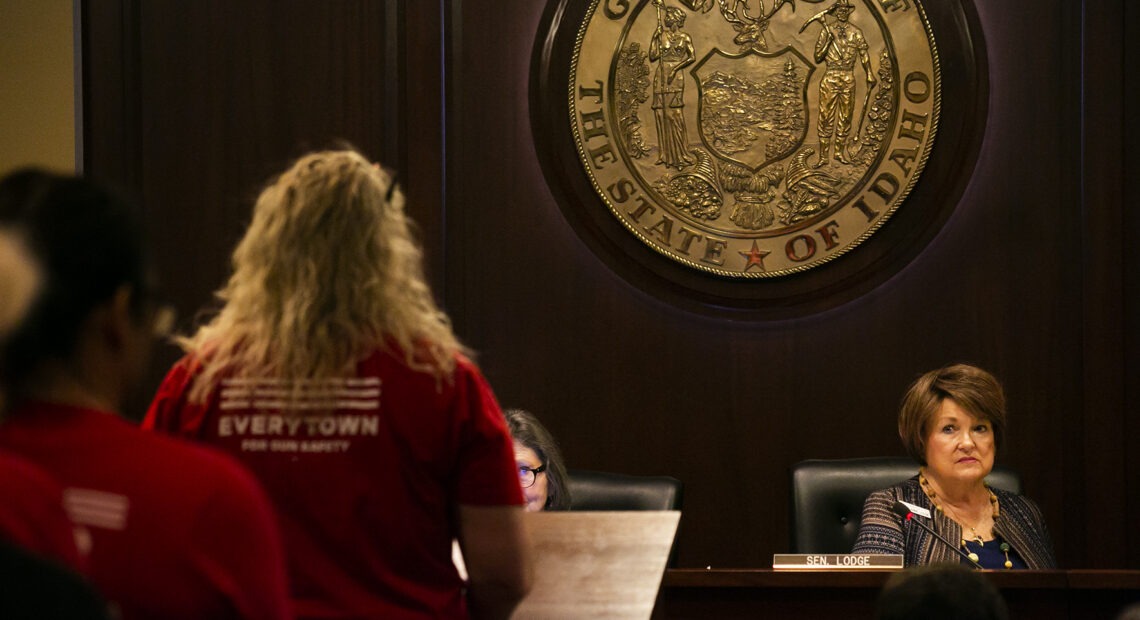 During a March 2020 hearing, Senate State Affairs Committee chairwoman Patti Anne Lodge eyes a line of activists against gun violence ready to testify against a guns-in-schools bill. CREDIT: Sami Edge/Idaho EdNews