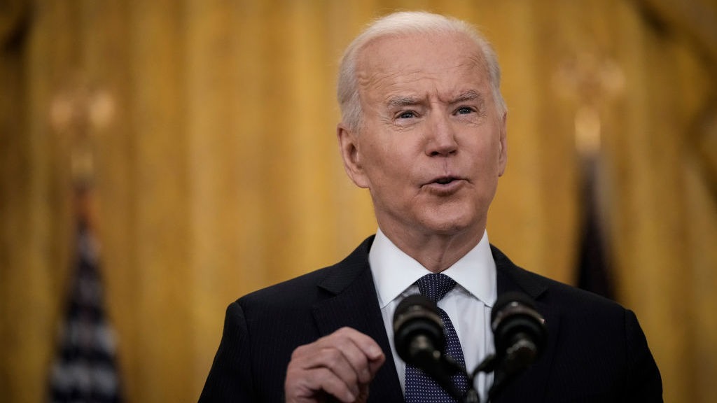 President Biden delivers remarks on the economy Monday in the East Room of the White House, pushing back on critics who say the American Rescue Plan is making the economy worse. CREDIT: Drew Angerer/Getty Images