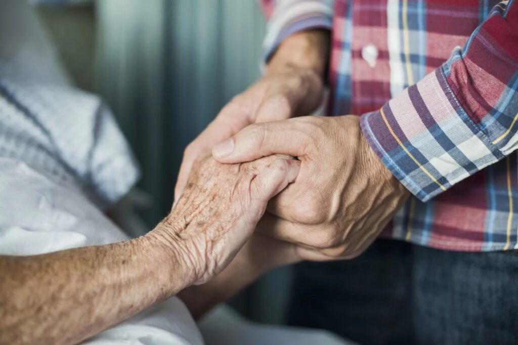 The COVID-19 pandemic has been particularly difficult for unpaid caregivers, with many reporting symptoms of stress, anxiety, and depression. CREDIT: Portra Images via Getty Images