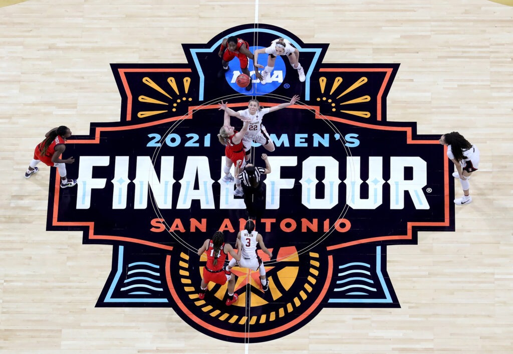 Cameron Brink #22 of the Stanford Cardinal and Cate Reese #25 of the Arizona Wildcats fight for the opening tipoff during the National Championship game of the 2021 NCAA Women's Basketball Tournament at the Alamodome on April 4 in San Antonio, Texas. The Stanford Cardinal defeated the Arizona Wildcats 54-53 to win the national title. CREDIT: Elsa/Getty Images