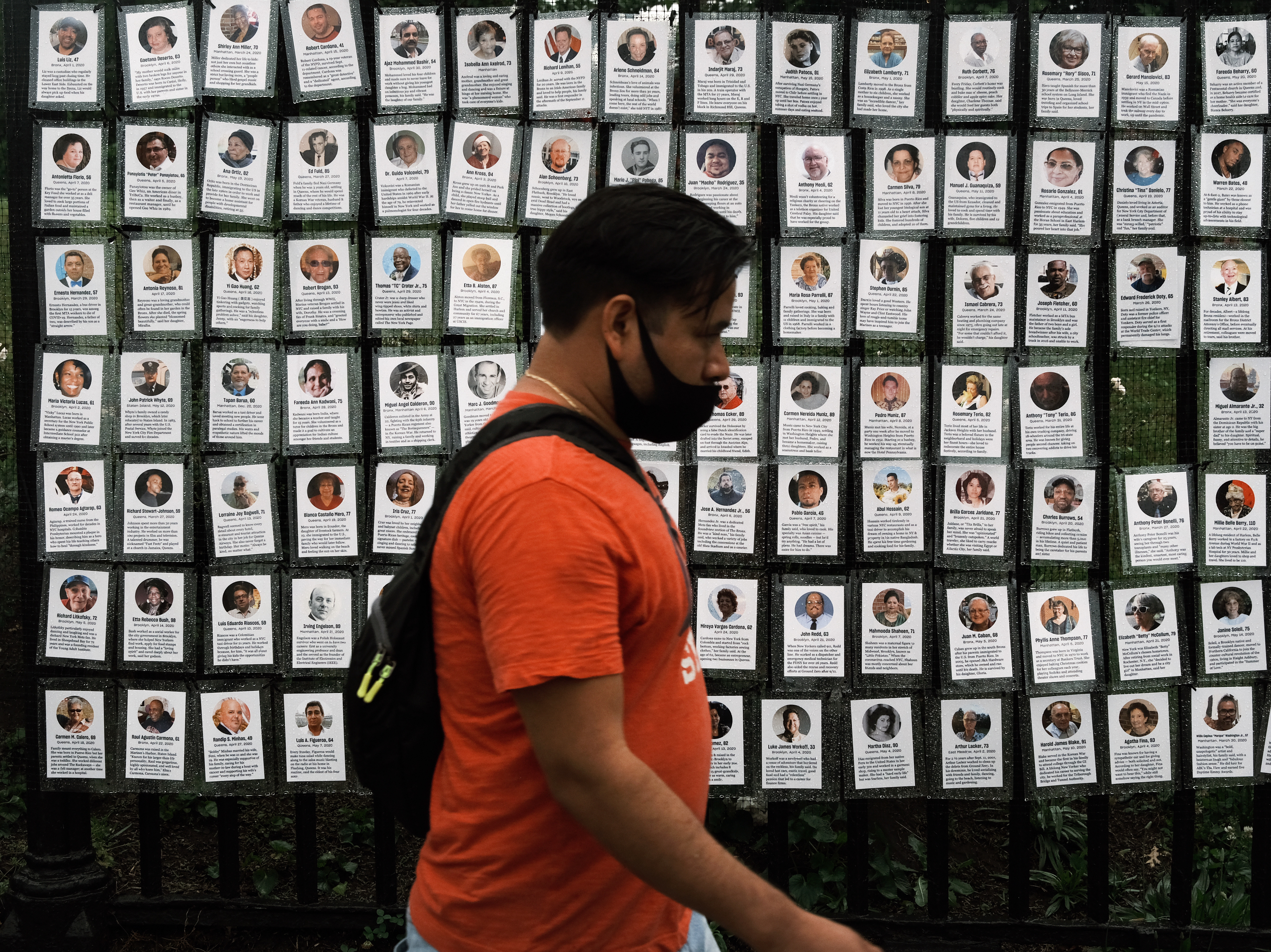 Memorials hang from the front gate of Greenwood Cemetery during an event and procession organized by Naming the Lost Memorials to remember and celebrate the lives of those killed by the COVID-19 pandemic in New York City. Spencer Platt/Getty Images