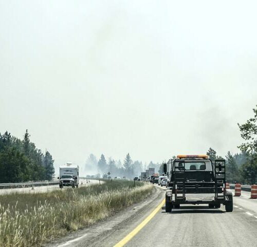 A section of I-90 is down to one lane due to heavy smoke near Cataldo, Idaho caused by fires in the area, July 7, 2021. CREDIT: Kathy Plonka/The Spokesman-Review via AP