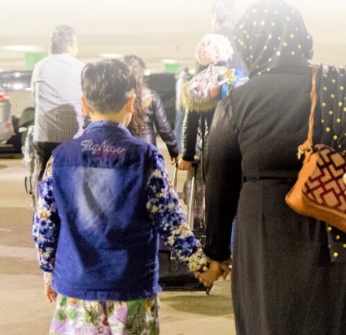 Image of parents and children Afghan refugees