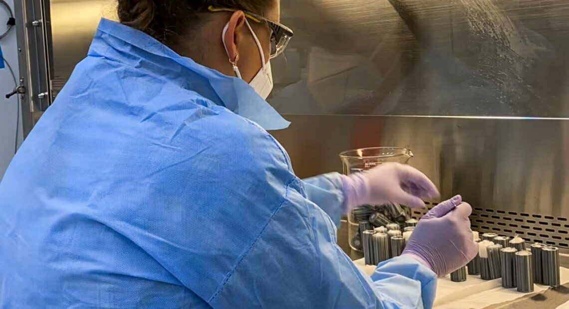 Pacific Northwest National Laboratory staff technician Yuliya Farris prepares sterile spaces used to hold soil in place for an experiment dubbed the Dynamics of the Microbiome in Space, known as DynaMoS. A SpaceX resupply mission will transport soil samples to the International Space Station, likely June 10.