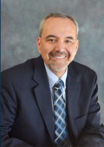 White man in blue suit