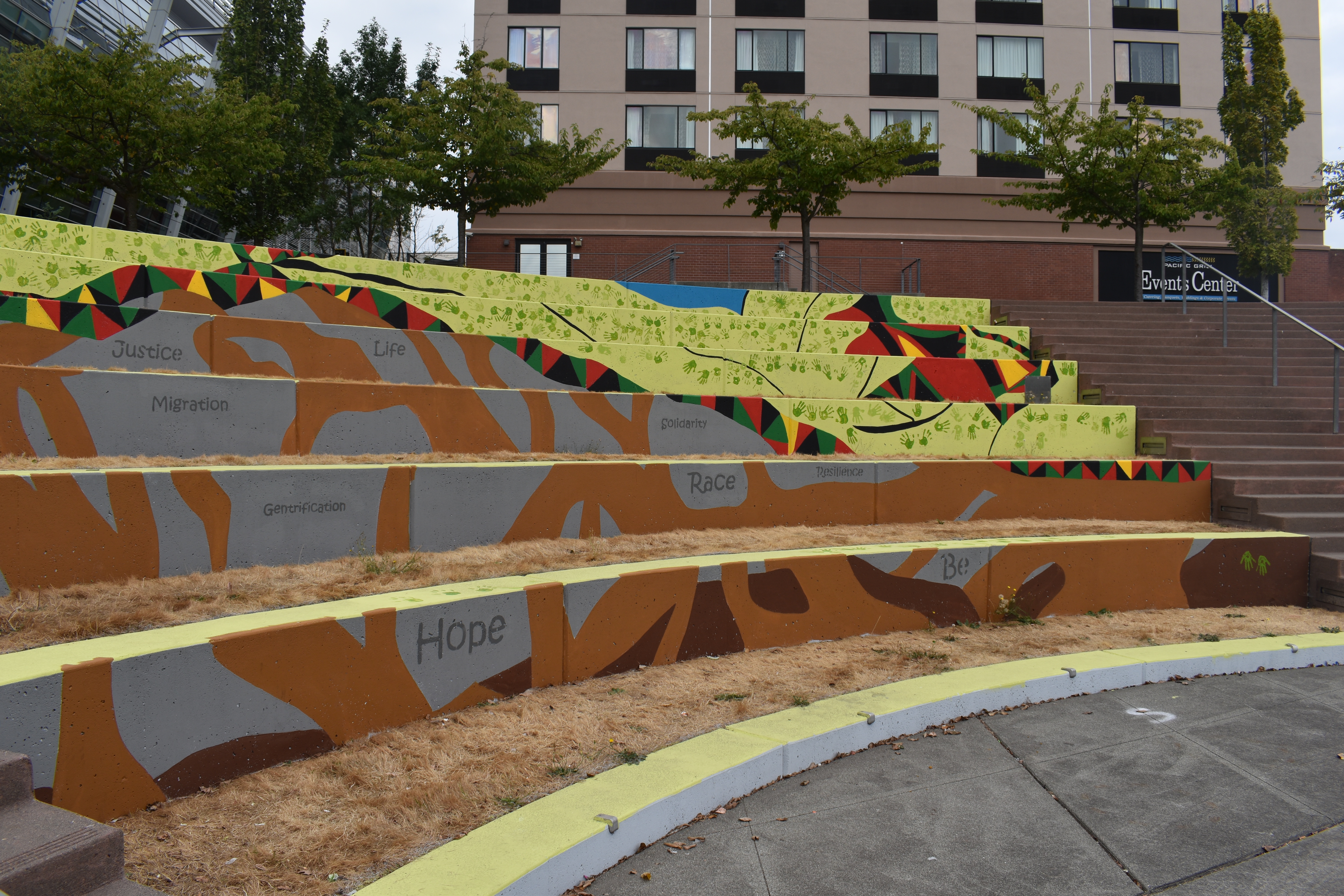 Tree roots are filled with words like "safety," "fear," and "joy," to reflect experiences and feelings of Tacoma's Black community. Photo by Lauren Gallup.