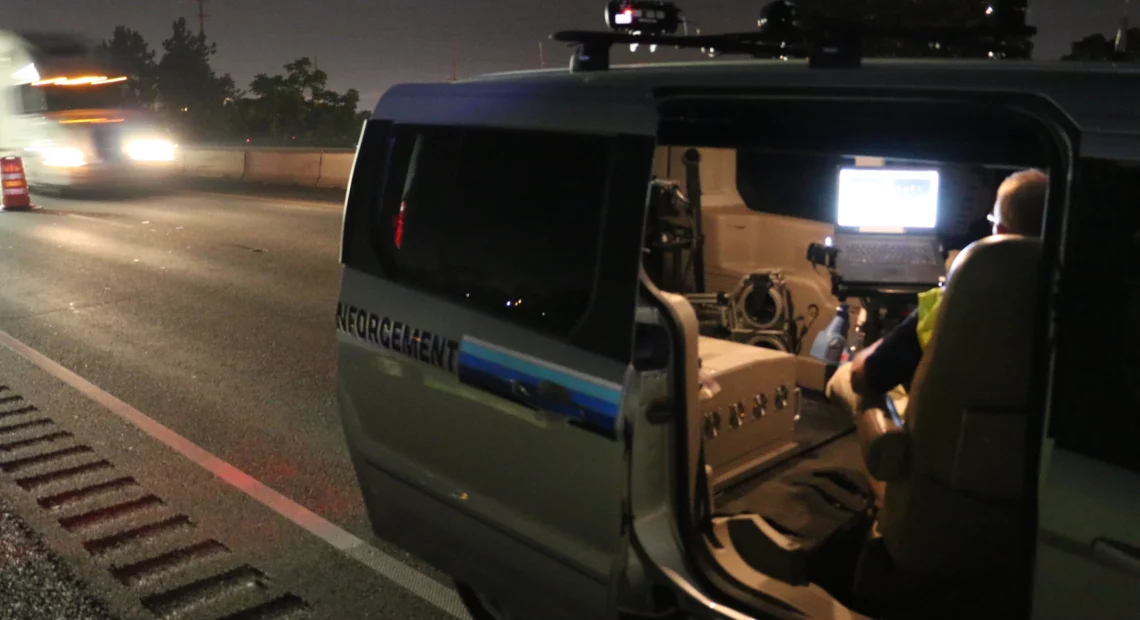 An officer works in a speed enforcement van along I-5 in Medford during construction in 2018. The effort to slow drivers nabbed one speeder going 91 mph in the 40 mph work zone