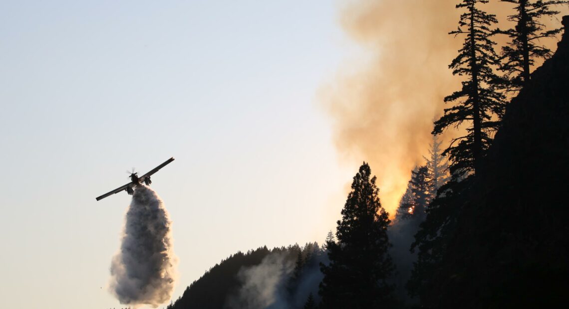 Aircraft flying over the Tunnel Five fire in the Columbia River Gorge.