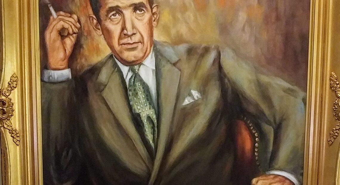 Portrait painting of Edward R Murrow with a golden frame