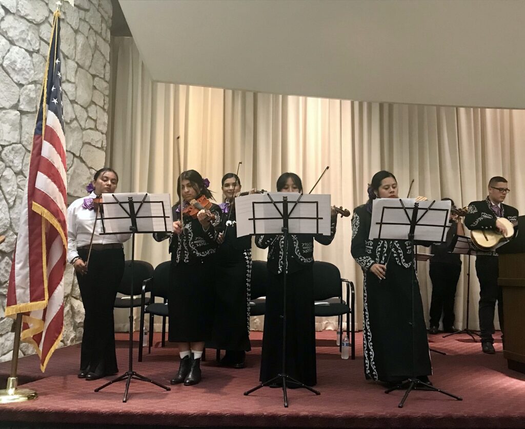 Maria Chavez and Pasco School District students playing. 