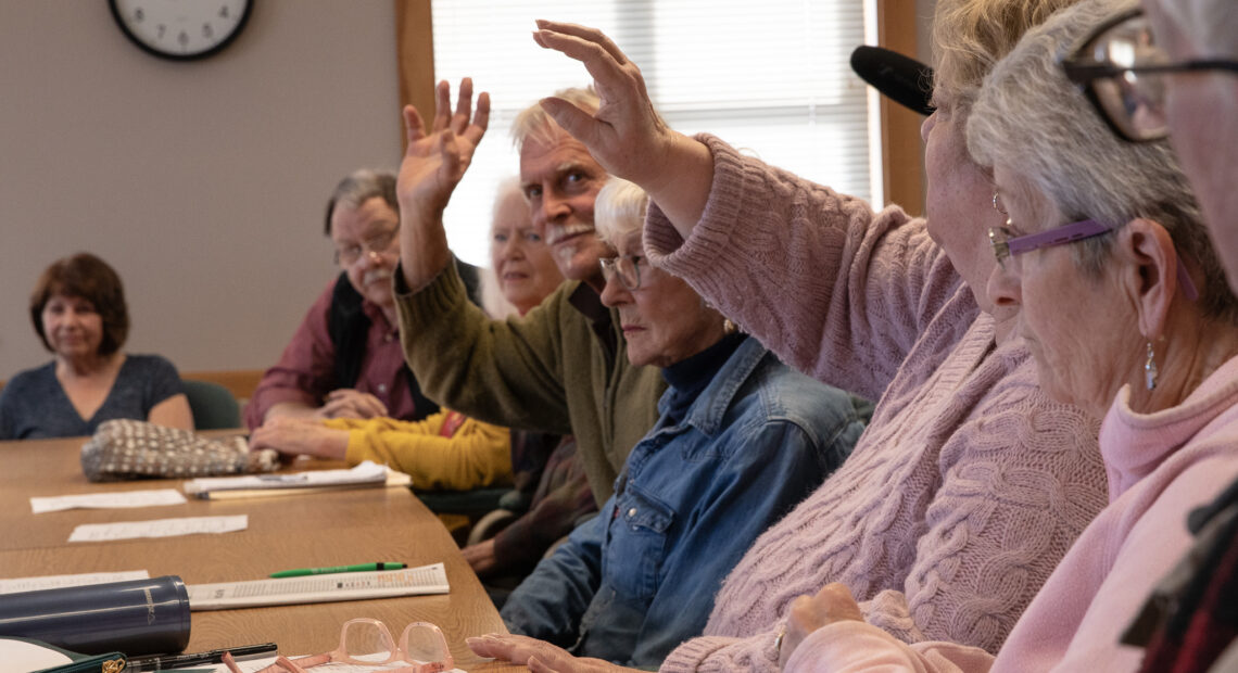 At the Port Angeles Senior and Community Center, a group of community members meets up every Thursday morning to talk politics. On March 14, the Thursday following Washington state's presidential primary elections, the place was filled with voices eager to discuss presidential politics. (Credit: Tela Moss / NWPB)