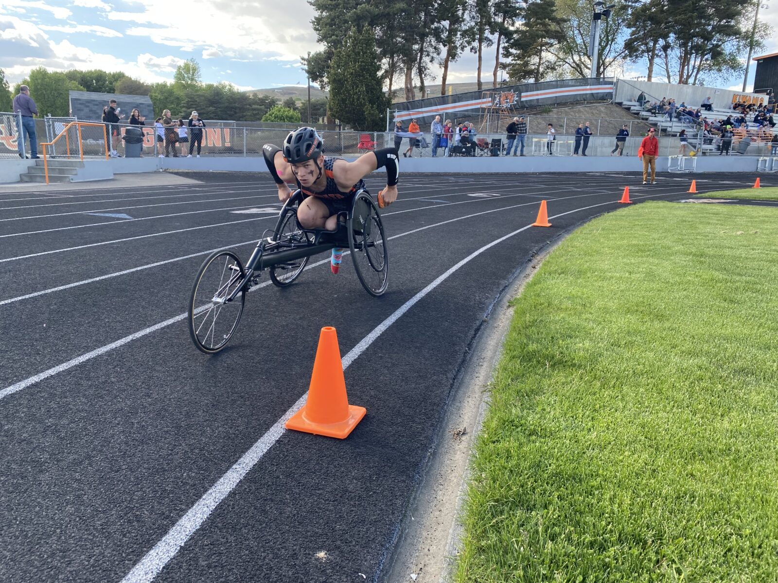 Ben Belino races the mile May 2 at Ephrata High School. The graduate had his left leg amputated after a bad car crash. The student plans to play wheelchair basketball for Eastern Washington University.