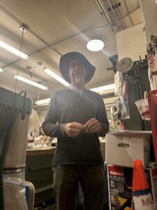 Miller at the doorway into his workshop, that he shares with other museum employees. (Credit: Lauren Gallup / NWPB)