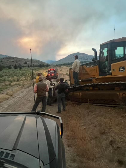 The Rattlesnake Creek Ranch crew building lines by themselves outside an area called Cow Creek on the Telephone Fire outside of Burns, Oregon. 