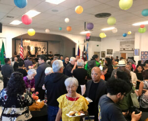 Members of the Filipino community enjoy traditional music and dishes during the celebration in Wapato.